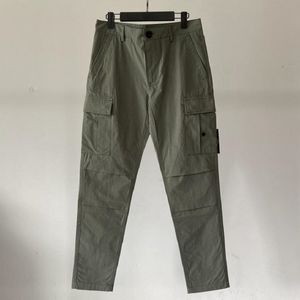 Nyaste plaggfärgade lastbyxor Pocket Pant Outdoor Men Tactical Byxor Loose Tracksuit Black Army Green