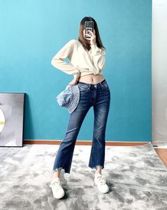 Kvinnors jeans kvinnors hög midja v-formade hem enkelt mode beskuren