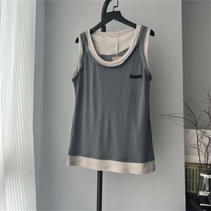 Mi * 23 İlkbahar/Yaz Yeni Sahte İki Parça Serisi Yığılmış Kolsuz Tank Top Cool Kadınlar 89489