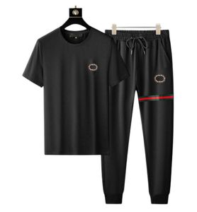 Herrspårar för män sportkläder t-shirt byxor passar sommar casual modedesigner sportkläder topp mäns byxor jogga andningsbanor T-shirt korta ärmbyxor