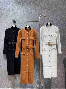 Vestidos casuais básicos designer nova moda outono inverno quatro bolsos de malha vestido reto com cinto mulheres o-pescoço manga longa botão de ouro 2ok5