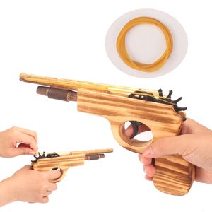 Giochi di novità Pistola giocattolo in legno per bambini con corda di gomma Puntelli cosplay per bambini Giochi all'aperto Giochi di tiro