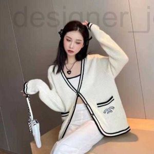 Suéteres femininos designer explosivo moda de luxo alta versão de pequeno vento perfumado início do outono agulha grossa jacquard fio preto e branco malha 6t84