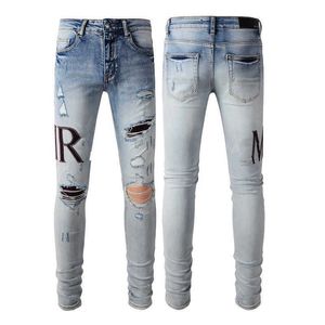 Designer de marca masculina feminina jeans roxo tamanho grande calças jeans calças perfuradas hip hop perfurado zíper amis calças carta remendo fino ajuste elástico pequeno pé jeans