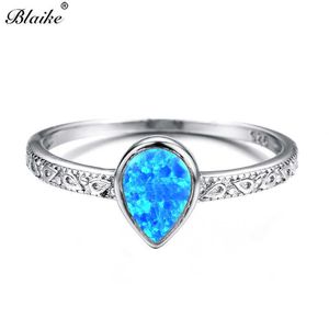 Pierścienie zespołowe luksusowe gruszka cięta Rainbow Stone Blue Purple White Fire Rings for Women Men Silver Color Birthstone Pierścień Wedding Bejdia AA230412