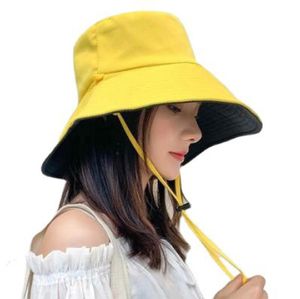 Sommar ny stor breda grimkvinnor hink hatt fast färg vikbar UV -skydd utomhus strandpanama mössa sol hattar