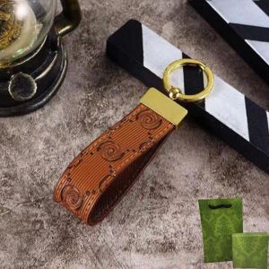 Chaves de fanfeta de carroceria de designer de falha com caixa de luxo de luxo keychain Letras de couro Chaves de galinheiros para mulheres e homens Bolsas pendentes keyrings