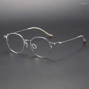 Montature per occhiali da sole Occhiali da uomo in titanio PURE di alta qualità Miopia Retro Round Front202315 Occhiali da vista da donna extra leggeri