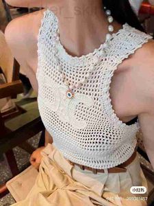 Kvinnor stickar Tees Designer 2022 Summer Thin Heavy Work Hollow Out Handmade Hook Flower Loose Sleeveless Tank Top Knit Layered T-Shirt O50E