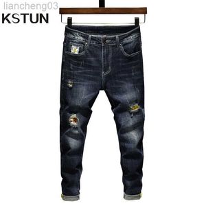 Herr jeans hiphop jeans män elasticitet mörkblå rippade jeans för pojkar smala fashion streetwear byxor förstörda man jeans lapp kläder w0413