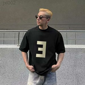 Designer Essstenials skjortor Double Line Summer Fashion Märke Herrpar Lossa E-bokstaven flockad Kort ärm T-shirt FearofGod