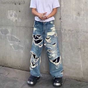 Jeans da uomo Pantaloni jeans distrutti stile Vibe da uomo Pantaloni jeans hip-hop oversize strappati Hi Street Pantaloni larghi attillati W0413