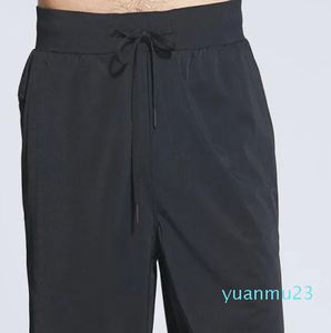 Män shorts snabbt torkning av yoga sportkondition korta byxor har cinchable dragkord sommarträning tröjor med bakre dropin