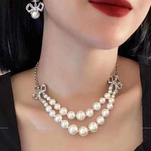 Designer Viviene Westwoods Empress Dowager Full Diamond Bow Double Layer Pearl Necklace Women's Design Sensory Jewelry Light Luxury Sparkling Diamond Collar Chain