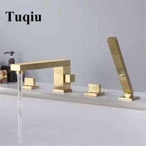 Set doccia per bagno Rubinetto per vasca Tuqiu Miscelatore per lavello per vasca diffuso Rubinetto per vasca da bagno in ottone spazzolato oro / nero con testa a mano