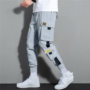 Calça masculina bolsões laterais de carga de harém fibrons fitas de hip hop preto masculino casual masculino calças calças de streetwear casual de moda 230413