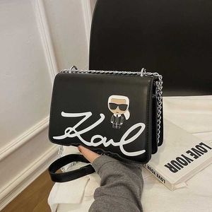 Karl designer sacos de moda casual bolsa diagonal novo coreano dos desenhos animados criativo bolsa ombro tendência pu corrente pequeno saco 231115