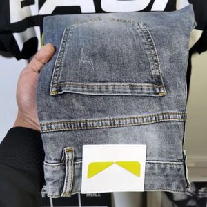 Jeans de grife masculino e feminino calças impressas jeans lavados estilo europeu e americano tecido elástico resistente ao desgaste juventude magro pé pequeno