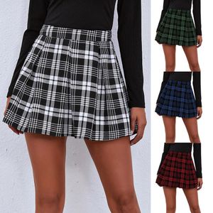 Saias mulheres mini saias de patinadoras de saia manchas de saia alta de cintura alta uniforme escolar mulher flaata roupas de skature roupas femininas 230413