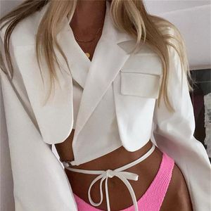 Kvinnors T -skjortor dubbelskikt bandage blazer smala kvinnor långärmad vriddown krage ficka spets upp skörd topp 2023 solid sexig navel streetwear