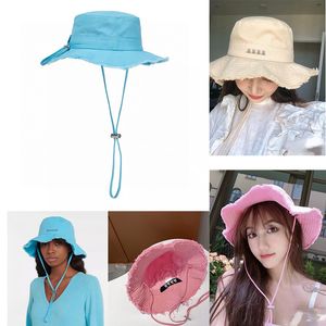 Kova Şapkası Tasarımcı Pembe Top Kapakları Drawstring Tasarım Kız Plajı Seyahat Şapkası Moda Sokağı Erkek Kadın Moda Şapkası Üstü Ayarlanabilir Geniş Kötü Şapkalar