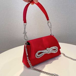 豪華な女性シックなラインストーン弓のハンドバッグデザイナー光沢のあるクリスタル台形サテンイブニングクラッチ財布財布ウェディングパーティーアンダーアームバッグ