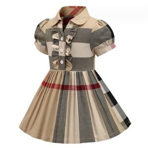 Gorąco sprzedawane dziewczyny sukienka wysokiej jakości ubranie Child's 2024 Spring Nowe sukienki z paski z krótkim rękawem Modne sukienki księżniczki