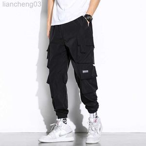 Calça masculina moda masculino calça de carga Hip Hop Joggers Cargo Pants Men Harém Pants Multi-bolso Man Sortpants Sweetwear Casual Mens calças W0414