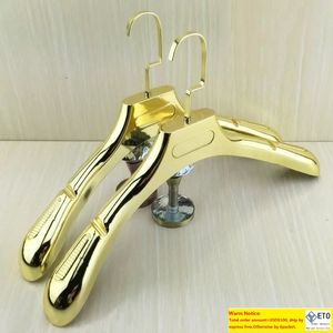 10 PcsLot High Grade Beautiful Shiny Golden Wide Shoulder Luxury Gold Plastic Clothes Hanger Rack for Coats Pants Wedding Dress