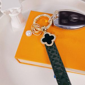 designer key chain for womens self defense keychains 24k gold-plated leather four-leaf clover with diamond belt pearl car key chain