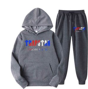 Tracksuit Trapstar Brand Printed Sportswear Men's T Shirts 16 Färger varma två stycken Set Loose Hoodie Sweatshirt Pants Jogging Classic Design 61ESS