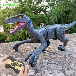 ElectricRC Animali RC Dinosauro Raptor Robot elettronico intelligente 24G Telecomando Musica Luce Giocattolo Giocattoli elettrici per bambini ragazzi regalo 231114