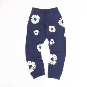 Herrjacka Kapok Coat Pants Denim tårar Autumn Winter Kanyes Full Print Foam Hip Hop Loose White Flower Jeans Brand Jeans Jacka ReadyMade Hoodie tårar Flower S0JP