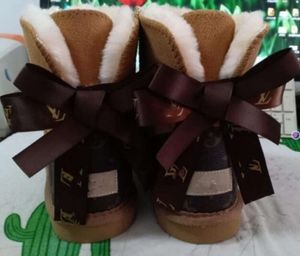 Venda quente aus design clássico l arco u botas femininas neve bowknot manter quente curto inverno couro genuíno pele de carneiro pelúcia sapatos de algodão quente