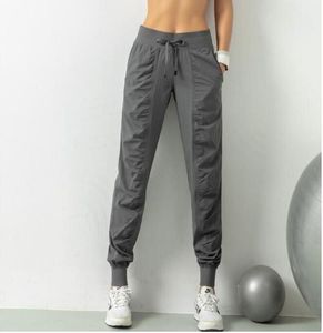 Yoga LL Breathable Sports Pants Gym Clothes Women's Joggers Quick Dry Slim Loose Running Training Fitness Leggings Nine Point Pocket Casual Trouses lu