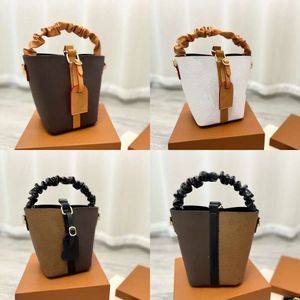 Luxurys Designer Brand Old Flower Bucket Bag高品質の革シンプルなハンドバッグファッション女性エレガンスレターショルダークロスボディバッグウォレットショッピングトートバッグ