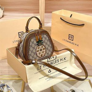 Tasche 26 % RABATT Designer-Handtasche Einkaufsagentur Hong Kong aus echtem Leder neue Ananas-Stickerei kleine quadratische vielseitige Retro-Umhängetasche für Damen