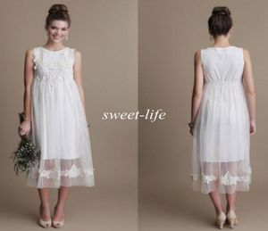 Abiti da sposa vintage premaman corti lunghezza tulle pizzo bau senza maniche vita impero 2019 abiti da sposa economici festa di nozze sulla spiaggia6320747