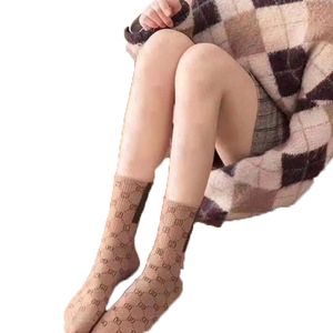 2023 Дизайнерские мужские и женские носки 5 пары спортивные носки Зимние сетевые буквы