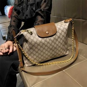 Bag 32% OFF Designer handbag Hong Kong Women's New Large Capacity Commuter Chain Big Leather One Shoulder Oblique Straddle Tote Bag