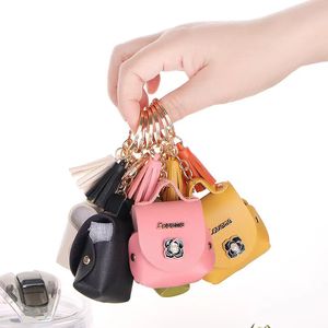 Modedesigner-Schlüsselanhänger, Herren- und Damentaschenverschluss, Schlüsselanhänger, Kopfhörertasche, handgefertigtes Lederanhänger-Schlüsselanhänger-Zubehör