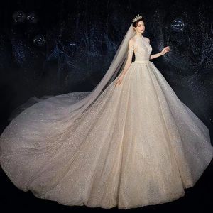 Abiti da sposa Abiti da sposa Modesti Abiti da sposa con maniche lunghe con nappe Abiti da sposa trasparenti con collo gioiello Pizzo Appliquato con perline Paillettes in cristallo Taglie forti Robe De Mariee Realizzato su misura