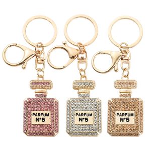 Moda parfum garrafa pingente balançar encantos chaveiros luxo prata champanhe rosa diamante pavimentado saco carro chaveiro jóias presentes