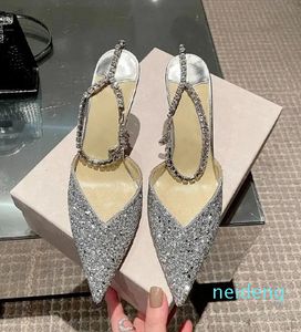 Elbise ayakkabıları Sequin Rhinestone Zinciri Kadın Yüksek Topuklular 2023 Yaz Markası Saçlı Ayak Parçası Stiletto Kristal Kelime Kemer Ziyafet