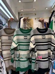 C Nowe sweter kobiety retro leniwe paski skrętu splatanie w długim luźnym dzianinowym topie