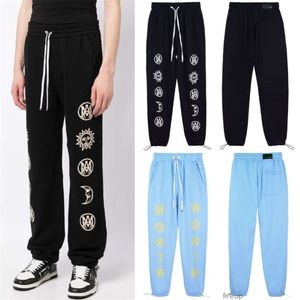 Amri Designers Casual Spant Męs Spodnie spodnie spodnie Trendy sznurka serce z kapturem z kapturem Nowe amerykańskie High Street Mens Womens Wszechstronne sporty zwyczajne proste