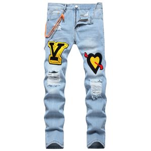 Blå rippade mäns jeans sommar casual hålbyxor för manlig mode slim fit broderi lapptäcke denim byxor pantalones para hombre vaqueros