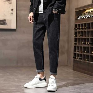 Mäns jeans Autumn Black Jeans för män Ny trend mångsidig avancerad lös raka grödor för män