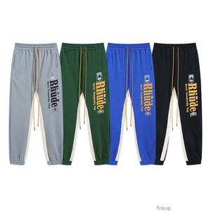 Designers Casual Pant Mens Trousers Sweatpants Rhude 23 New Spliced Drawstring Letter Printing Tie Feet Guard Pants Men Women High Street Sports Casual