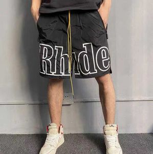 Erkek Şort Rhude Yaz Tasarımcısı Plaj Pantolon New York Limited Yansıtıcı Mektup Baskı Drawstring Mesh Sıraslı High Street 5 inç Gevşek Şort Erkekler